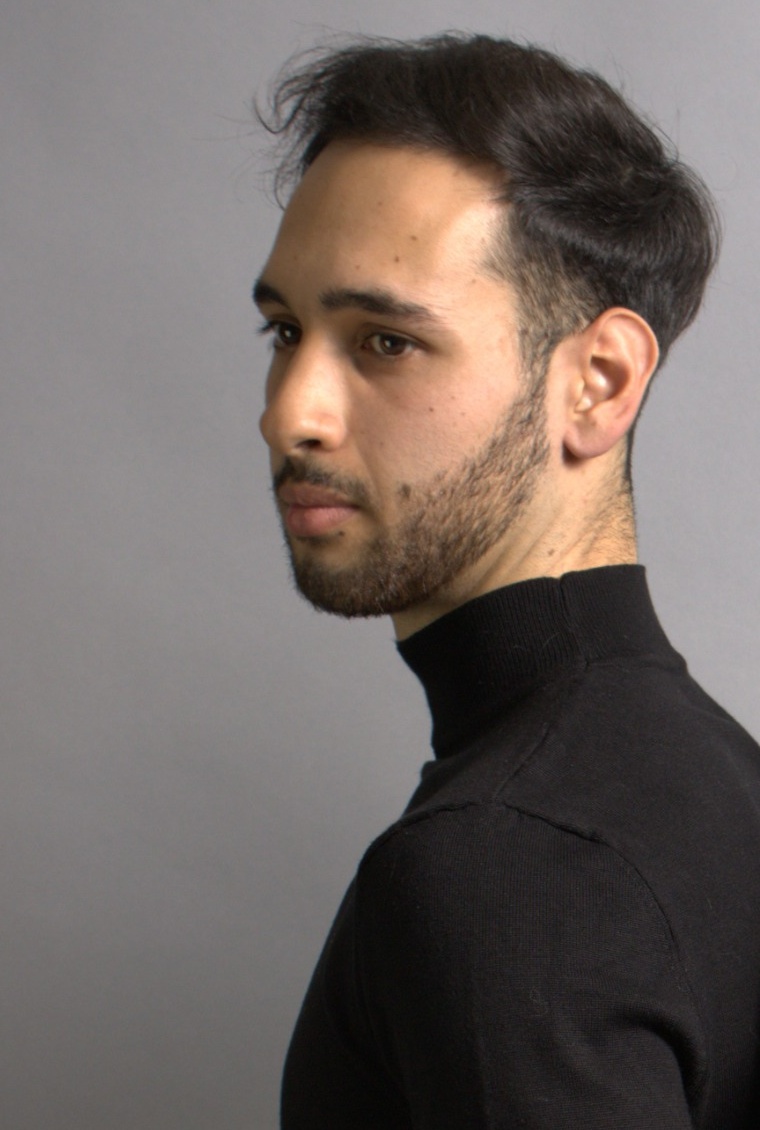 Side-profile portrait of Aleandro Mallia